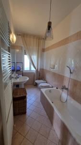 Koupelna v ubytování Suite Dalmine + 29 fotografií