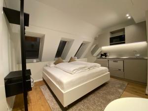 Voodi või voodid majutusasutuse Blackhome Wien I contactless check-in toas