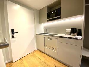 Köök või kööginurk majutusasutuses Blackhome Wien I contactless check-in