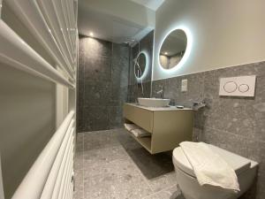 Vannituba majutusasutuses Blackhome Wien I contactless check-in