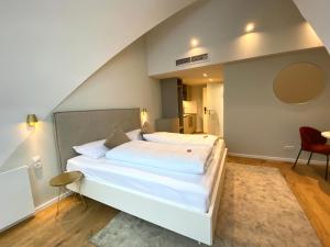 Voodi või voodid majutusasutuse Blackhome Wien I contactless check-in toas