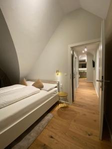 Voodi või voodid majutusasutuse Blackhome Wien I contactless check-in toas