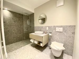 Vannituba majutusasutuses Blackhome Wien I contactless check-in
