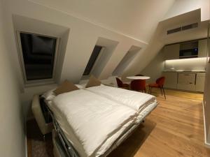 Voodi või voodid majutusasutuse Blackhome Wien I contactless check-in toas