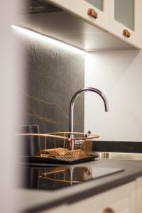 Η κουζίνα ή μικρή κουζίνα στο Apartamentos Las Alas +79 φωτογραφίες