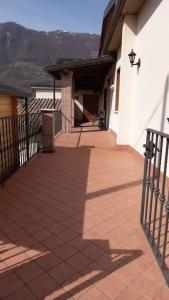 a porch of a house with a fence at Country-House vista montagna in Foce