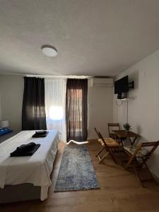 TV a/nebo společenská místnost v ubytování Apartments Graz + 32 fotografií