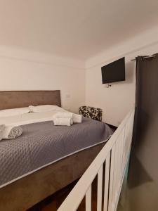 Una cama o camas en una habitación de Galleria San Giorgio