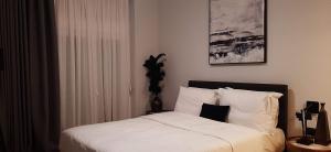 Postel nebo postele na pokoji v ubytování Homing Volos Inspired Modern Living