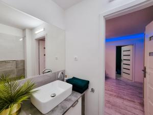 Koupelna v ubytování Apartament Green Mrągowo-Mazury,blisko plaża, centrum! Wi-fi! + 10 fotografií