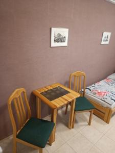 Postel nebo postele na pokoji v ubytování Penzion Kelčany u Kyjova