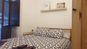Postel nebo postele na pokoji v ubytování La Casita de Guille