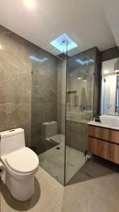Ένα μπάνιο στο Acogedor y moderno departamento +28 φωτογραφίες