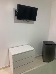 TV a/nebo společenská místnost v ubytování Hotel Conquistador Santo Domingo