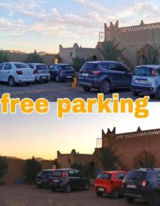 un gruppo di auto parcheggiate in un parcheggio di Luxury Desert Camp a Merzouga