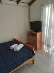 Postel nebo postele na pokoji v ubytování Calfu