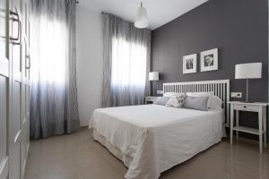 Postel nebo postele na pokoji v ubytování Apartamentos Diaber San Leandro