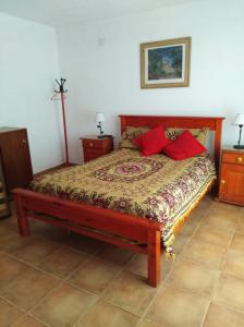 Uma cama ou camas num quarto em Malvina