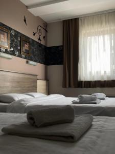 En eller flere senge i et værelse på Apartment Lorena