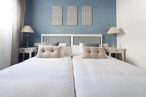 Postel nebo postele na pokoji v ubytování Apartamentos Diaber San Leandro
