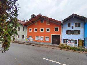 a row of houses on the side of a street at Ferienhaus Theodor OG in Laufen