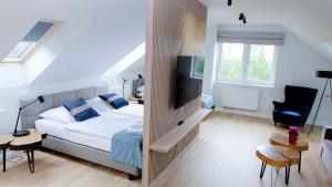 Łóżko lub łóżka w pokoju w obiekcie Hotel Rezydencja AS & Spa-Najwyżej w Karpaczu