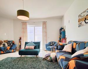 Khu vực ghế ngồi tại Your Room, Your Apartment, Your Shared Pool