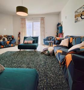 Khu vực ghế ngồi tại Your Room, Your Apartment, Your Shared Pool