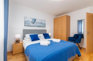 En eller flere senge i et værelse på Vila Ana Apartman 1 + 6 billeder