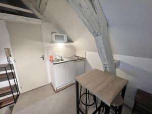 Kuchyňa alebo kuchynka v ubytovaní LE PACIFIC - Appartement spacieux centre ville