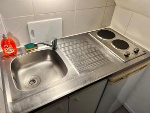 Kuchyňa alebo kuchynka v ubytovaní LE PACIFIC - Appartement spacieux centre ville