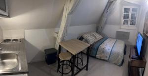Posteľ alebo postele v izbe v ubytovaní LE PACIFIC - Appartement spacieux centre ville