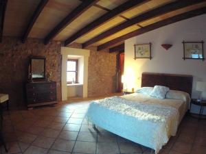 a bedroom with a large bed in a room at Ca'n Fosquet in Llucmajor +23 photos