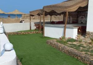 A garden outside Dolphin Continental Hotel