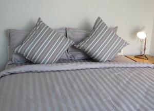 Postel nebo postele na pokoji v ubytování Non Du Lay Guesthouse