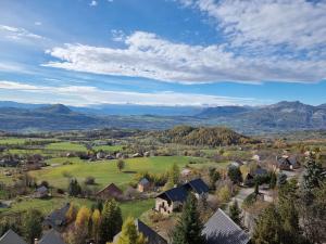 an aerial view of a small village in the mountains at Charmant Duplex Pied des Pistes - 6 Pers, Wifi, Balcon, Lave-linge - FR-1-393-163 in Saint-Michel-de-Chaillol