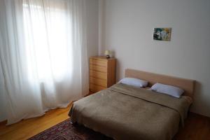 Cama o camas de una habitación en Appartamento Mirandola