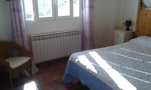 Posteľ alebo postele v izbe v ubytovaní Apartamento El Dragon Serrano
