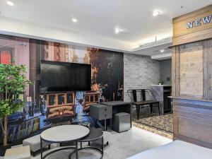 TV a/nebo společenská místnost v ubytování K Hotel - Yizhong