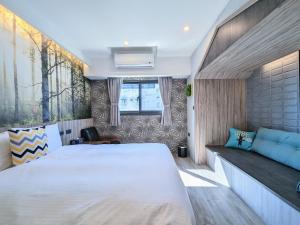 Postel nebo postele na pokoji v ubytování K Hotel - Yizhong