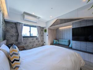 Postel nebo postele na pokoji v ubytování K Hotel - Yizhong