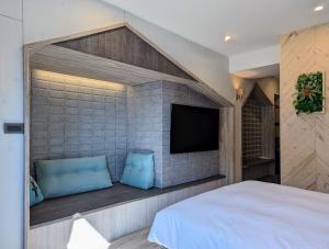 Postel nebo postele na pokoji v ubytování K Hotel - Yizhong