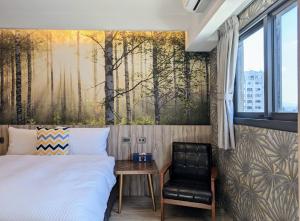 Postel nebo postele na pokoji v ubytování K Hotel - Yizhong