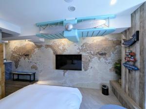 Postel nebo postele na pokoji v ubytování K Hotel - Yizhong