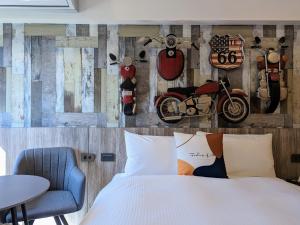 Postel nebo postele na pokoji v ubytování K Hotel - Yizhong