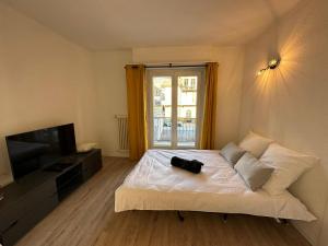 Postel nebo postele na pokoji v ubytování Sion Central Station proche toutes commodites