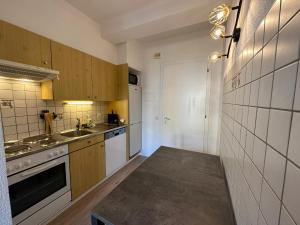 Kuchyň nebo kuchyňský kout v ubytování Sion Central Station proche toutes commodites