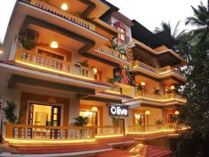 a large building with a one way sign on it at Olive Hotel Calangute Niwasa by Embassy Group in Calangute
