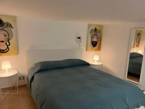 Ένα ή περισσότερα κρεβάτια σε δωμάτιο στο Casa Cavour