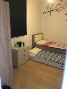 Ein Bett oder Betten in einem Zimmer der Unterkunft Hallmark Bursa